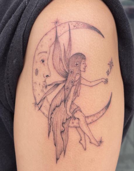 Grey Moon with Stars and Fairy Arm Tattoo