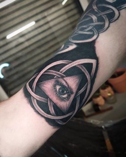 Celtic Ornament and All Seeing Eye Arm Tattoo