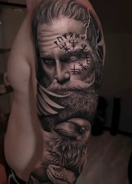 Viking Warrior with Bird and Snake Arm Tattoo