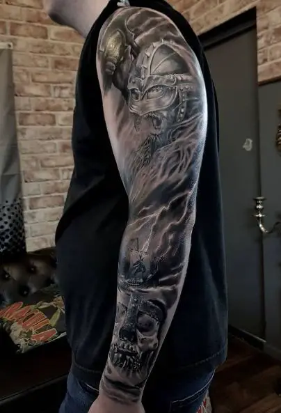 Skull and Viking Warrior with Axe Arm Sleeve Tattoo