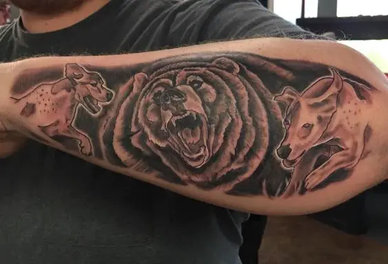 Hunting Dogs and Bear Forearm Tattoo