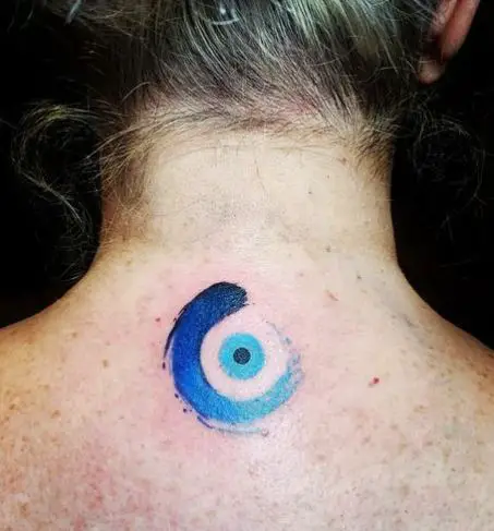 Colored Evil Eye Back Tattoo