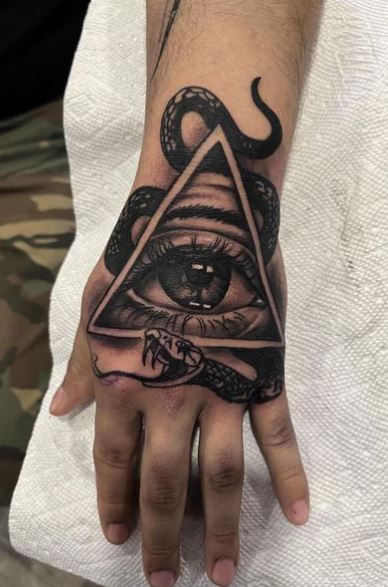 Snake and Eye of Providence Hand Tattoo
