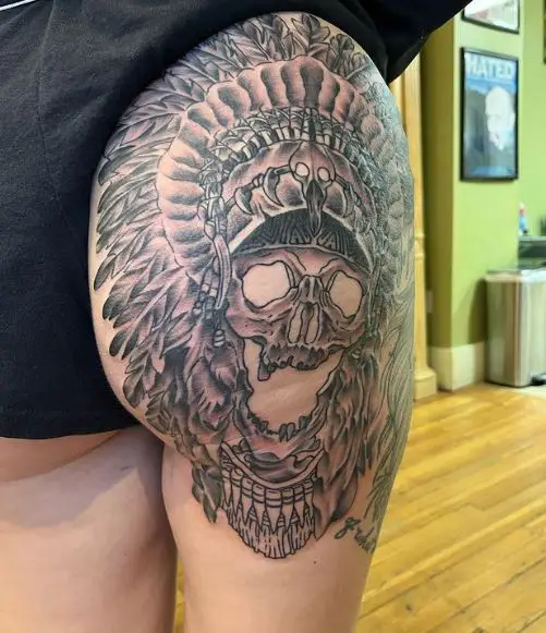 Skull with Indian Feather Hat Butt Tattoo