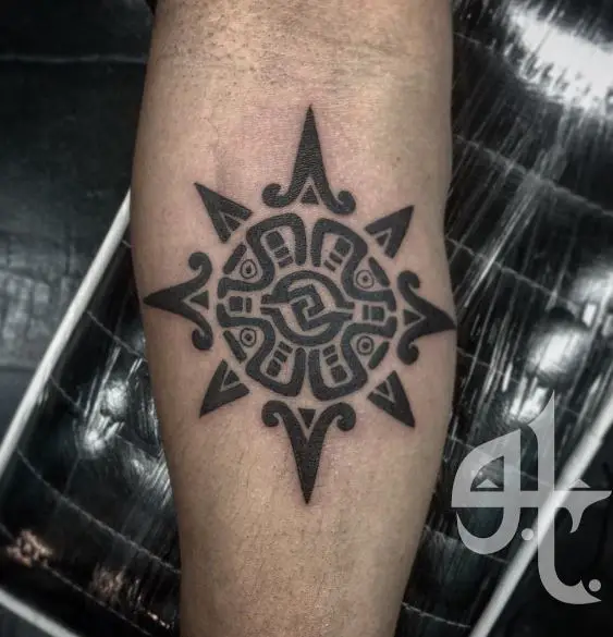 Black Mayan Sun Symbol Forearm Tattoo