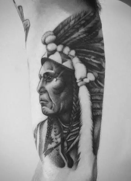Black and Grey Navajo Warrior with Feathers Arm Tattoo