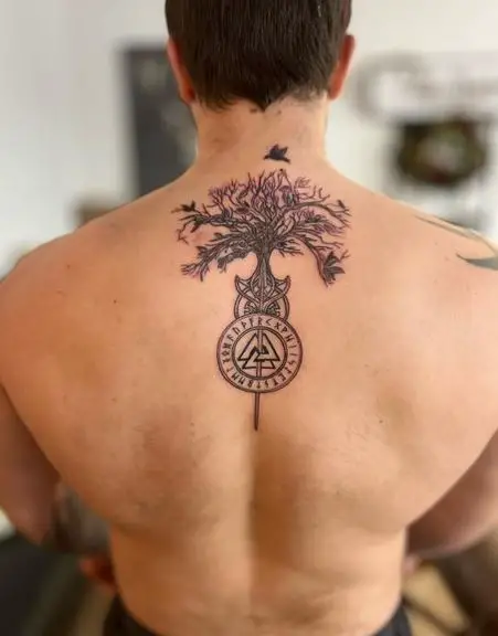 Black Viking Symbol Spine Tattoo