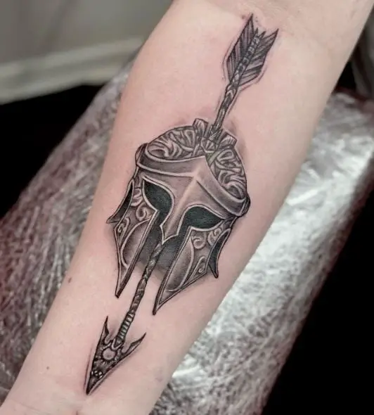Arrow and Spartan Helmet Forearm Tattoo