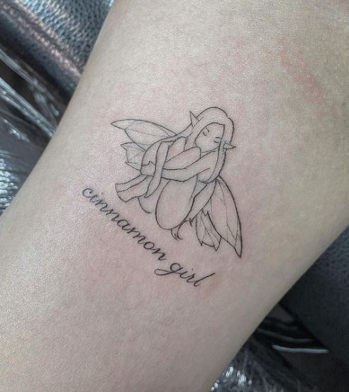 Sitting Fairy with Script Forearm Tattoo