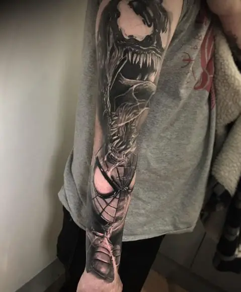 Black and Grey Venom and Spiderman Arm Tattoo