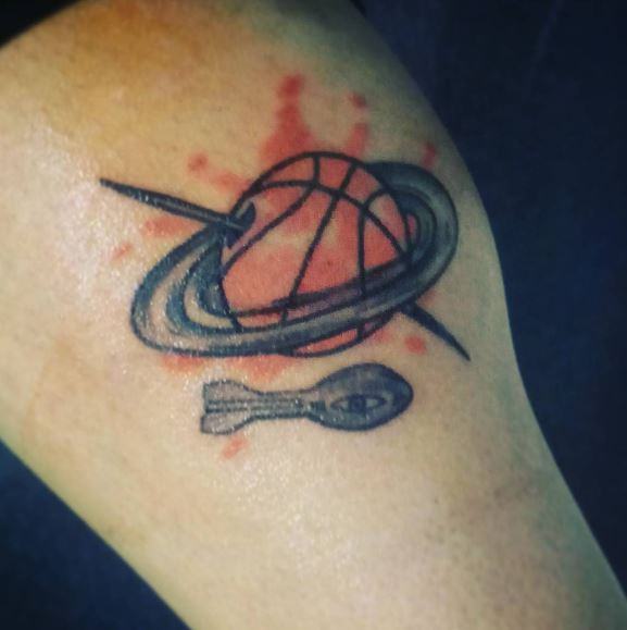 Space Ship and Saturn Inspired Basketball Arm Tattoo