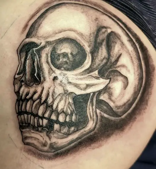 Grey Shaded Skull Butt Tattoo