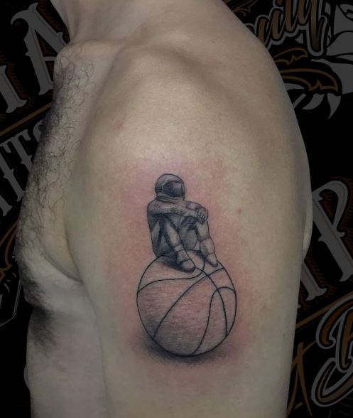 Astronaut and Basketball Arm Tattoo