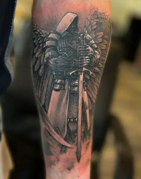 Black and Grey Angel Warrior with Sward Forearm Tattoo