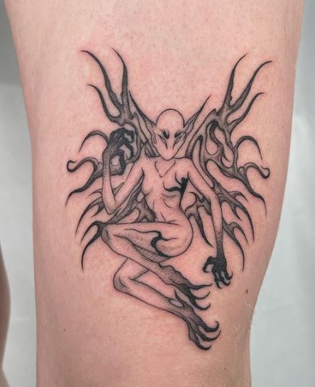 Black and Grey Devil Fairy Thigh Tattoo