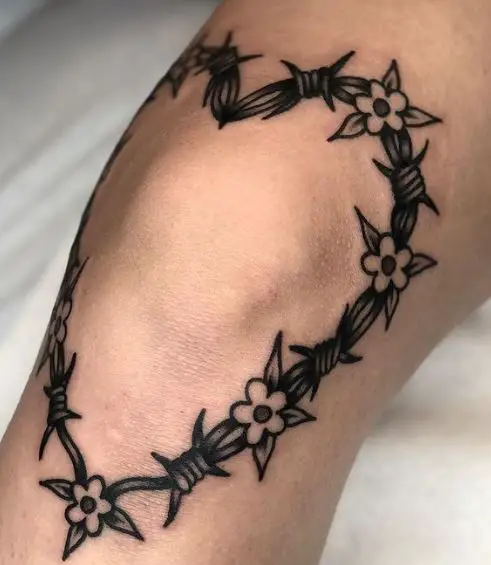 Flowers and Barbed Wire Knee Tattoo