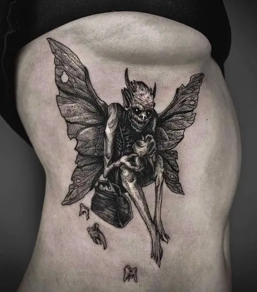 Black Devil Tooth Fairy Ribs Tattoo