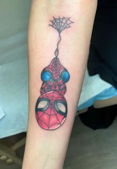 Colorful Upside Down Baby Spiderman Forearm Tattoo
