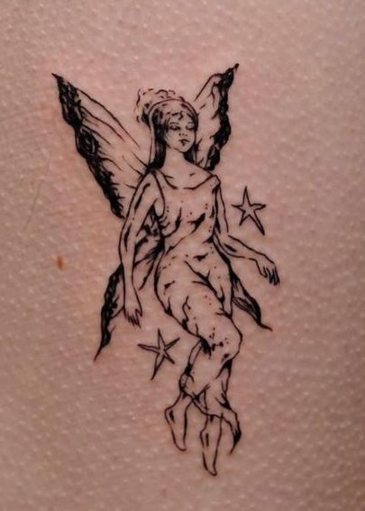 Stars and Fairy Thigh Tattoo