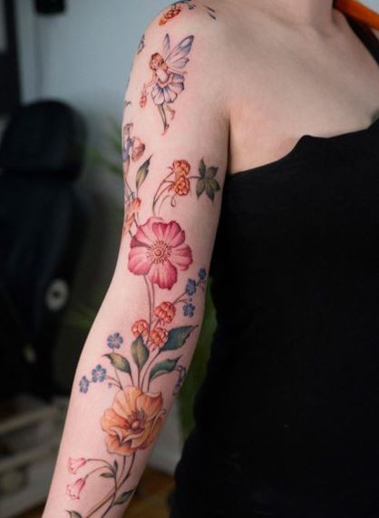 Colorful Flowers and Fairy Arm Tattoo