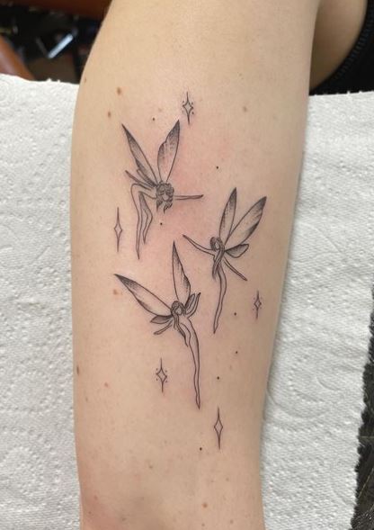 Stars and Dancing Fairies Arm Tattoo