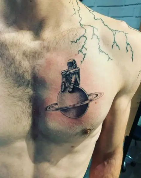 Astronaut and Saturn Chest Tattoo