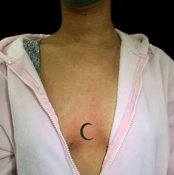 Black Crescent Moon Sternum Tattoo