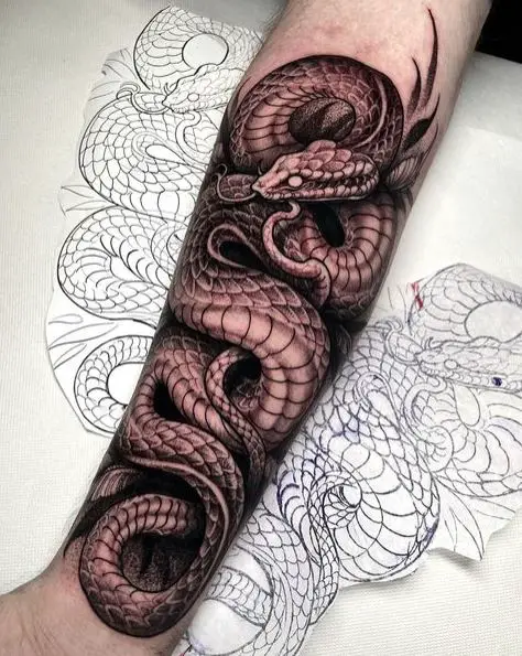 Black Work Coiled Snake Tattoo