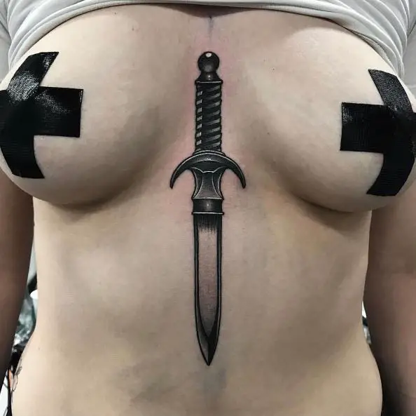 Black and Grey Dagger Sternum Tattoo