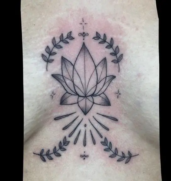 Black and Grey Lotus and Leaves Sternum Tattoo