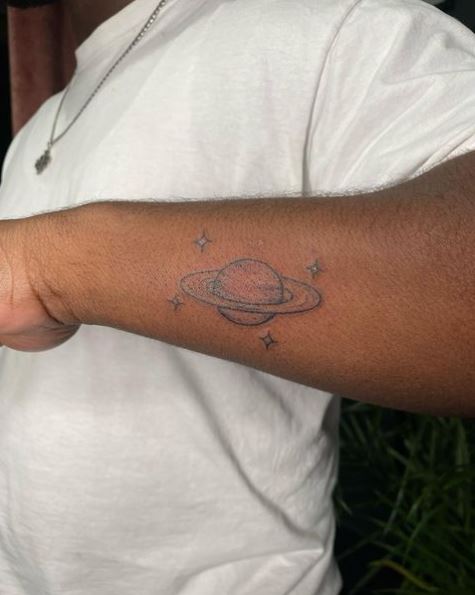 Black and Grey Saturn with Stars Forearm Tattoo