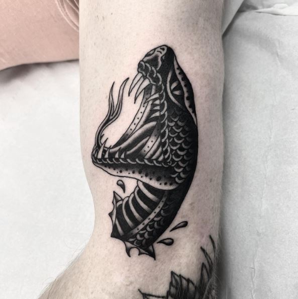 Black and Grey Snake Head Tattoo
