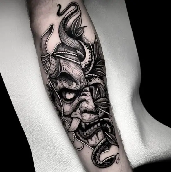 Black and Grey Snake and Demon Mask Forearm Tattoo