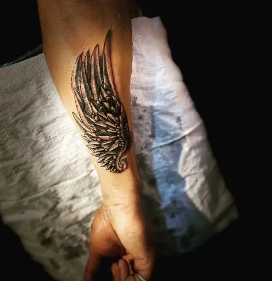 Black and Grey Wings Forearm Tattoo