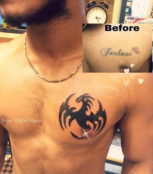 Bold Black Ink Dragon Chest Tattoo