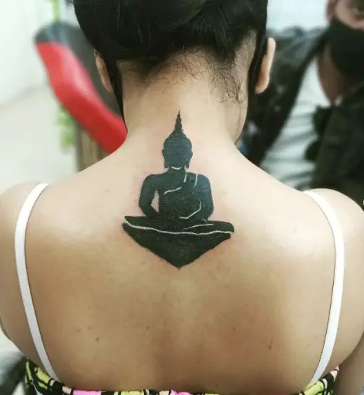Bold Black Inked Lord Buddha Back Tattoo