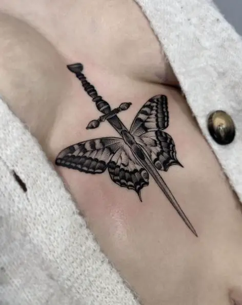 Butterfly Dagger Sternum Tattoo