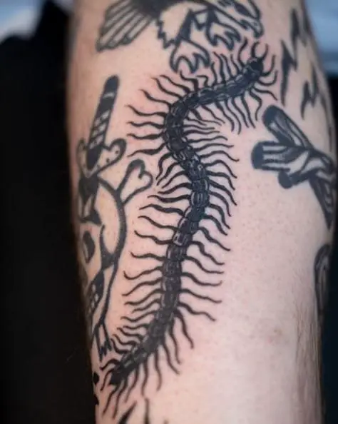 Creepy Centipede Thigh Tattoo