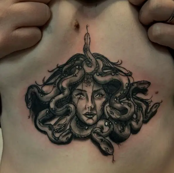 Dark Grey Medusa Sternum Tattoo