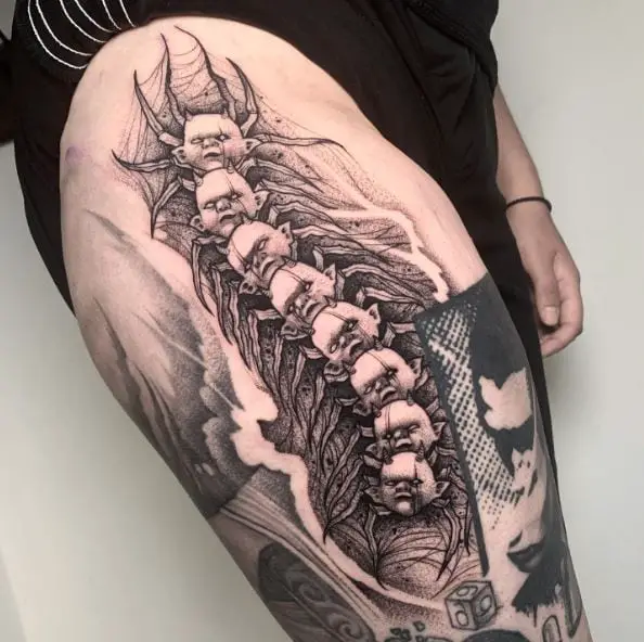 Demon Baby Face Centipede Tattoo