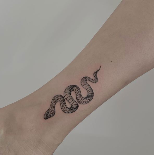 Dotted Snake Forearm Tattoo