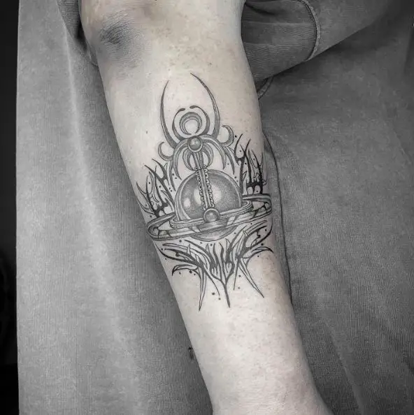 Evil Saturn Forearm Tattoo