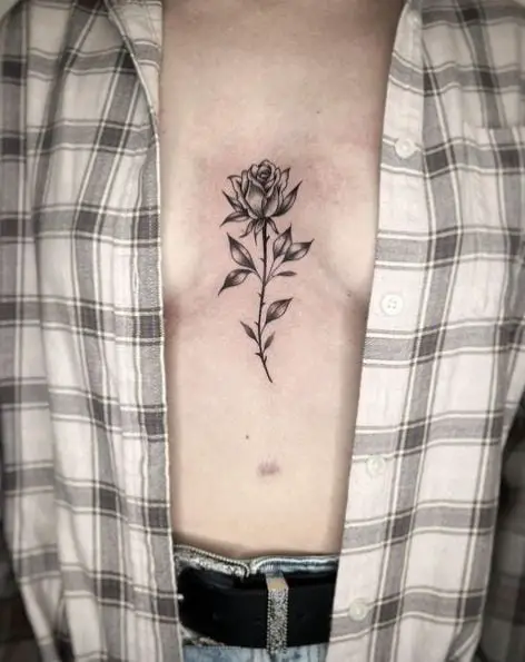 Grey Rose Sternum Tattoo