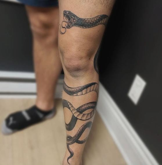 Grey Snake Leg Wrap Tattoo