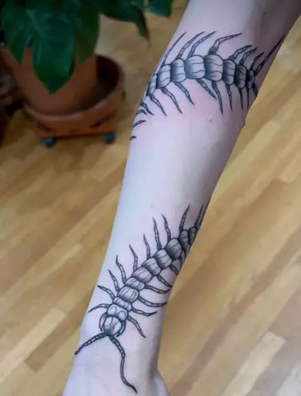 Greyish Arm Wrap Centipede Tattoo