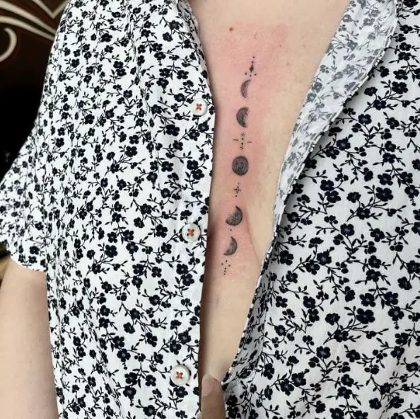 Greyscale Moon Phases Sternum Tattoo