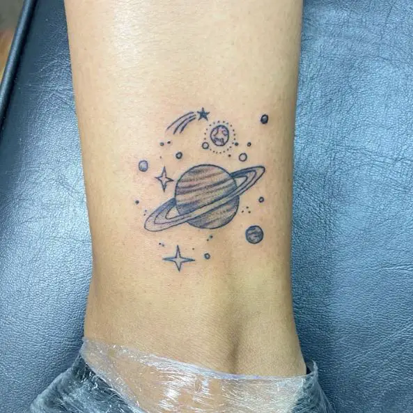 Greyscale Planet Ankle Tattoo