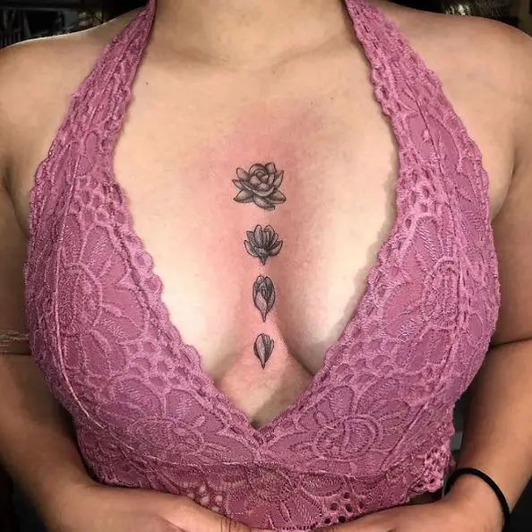 Growing Lotus Sternum Tattoo