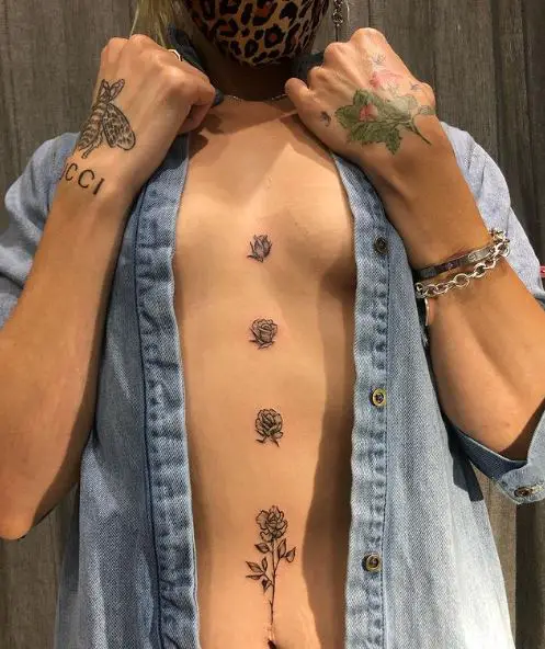 Growing Rose Sternum Tattoo