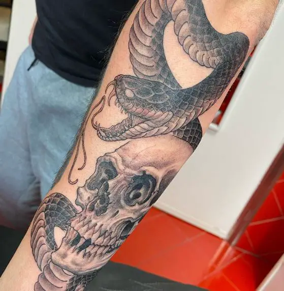 Human Skull and Snake Forearm Tattoo